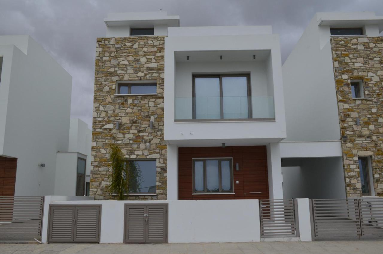Palm Tree Villas Livadhia Exterior photo
